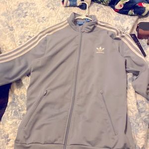 Adidas grey and white big kids XL fits Adult Small as I wore it… authentic